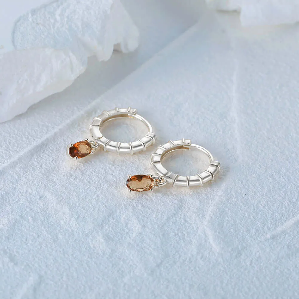 Huggie Hoop Earrings with Egg-Shaped CZ Diamond