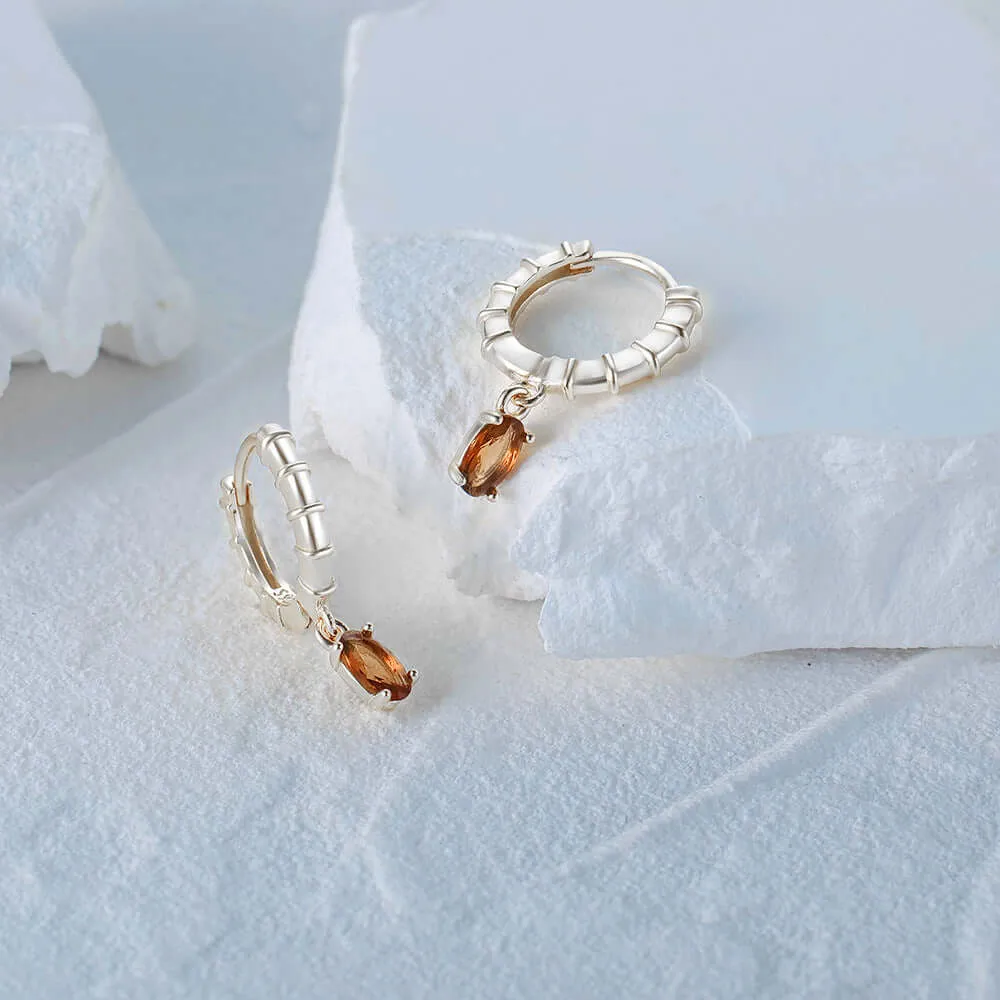 Huggie Hoop Earrings with Egg-Shaped CZ Diamond